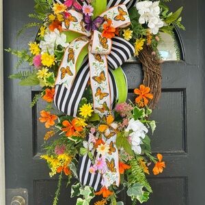 Colorful Floral Wreath with Butterfly Accents